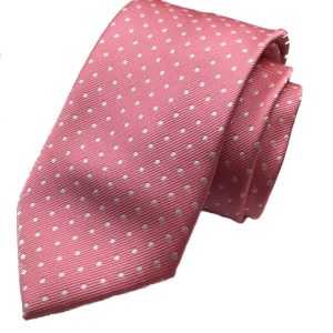 Corbata rosa con dibujo de topos.